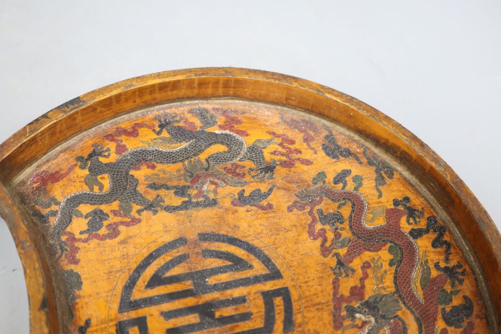 A 19th/20th century Chinese double circular wood and lacquer tray, length 42cm